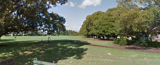 An image showing disc golf park full of tall green trees and grass