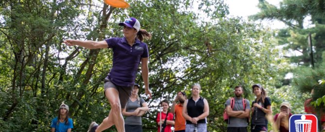 An image of ledgestone tournament opening a woman playing disc golf